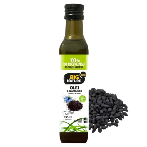 Big Nature olej z czarnuszki 250 ml tłoczony na zimno w butelce z zieloną etykietą obok ziaren czarnuszki