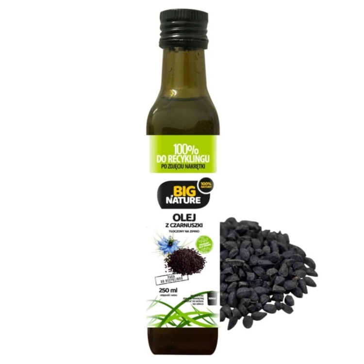 Big Nature olej z czarnuszki 250 ml tłoczony na zimno w butelce z zieloną etykietą obok ziaren czarnuszki